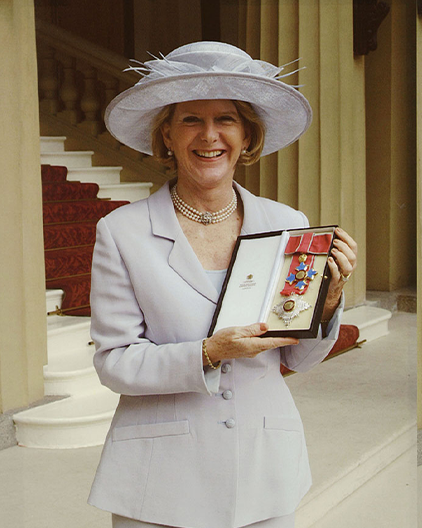 Dame Margaret receiving award